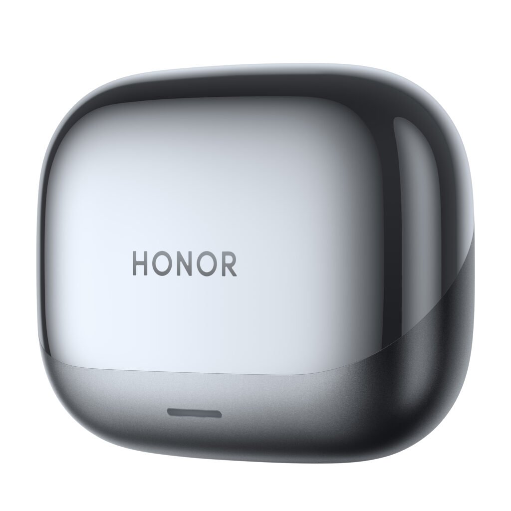 HONOR Earbuds 4 colocados dentro de su estuche junto a la caja del producto abierta
